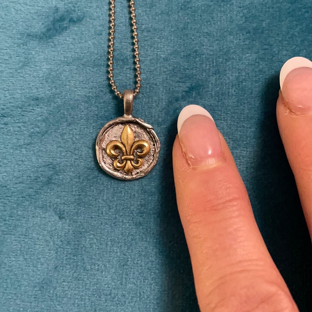 Fleur du lis pendant on 16” chain